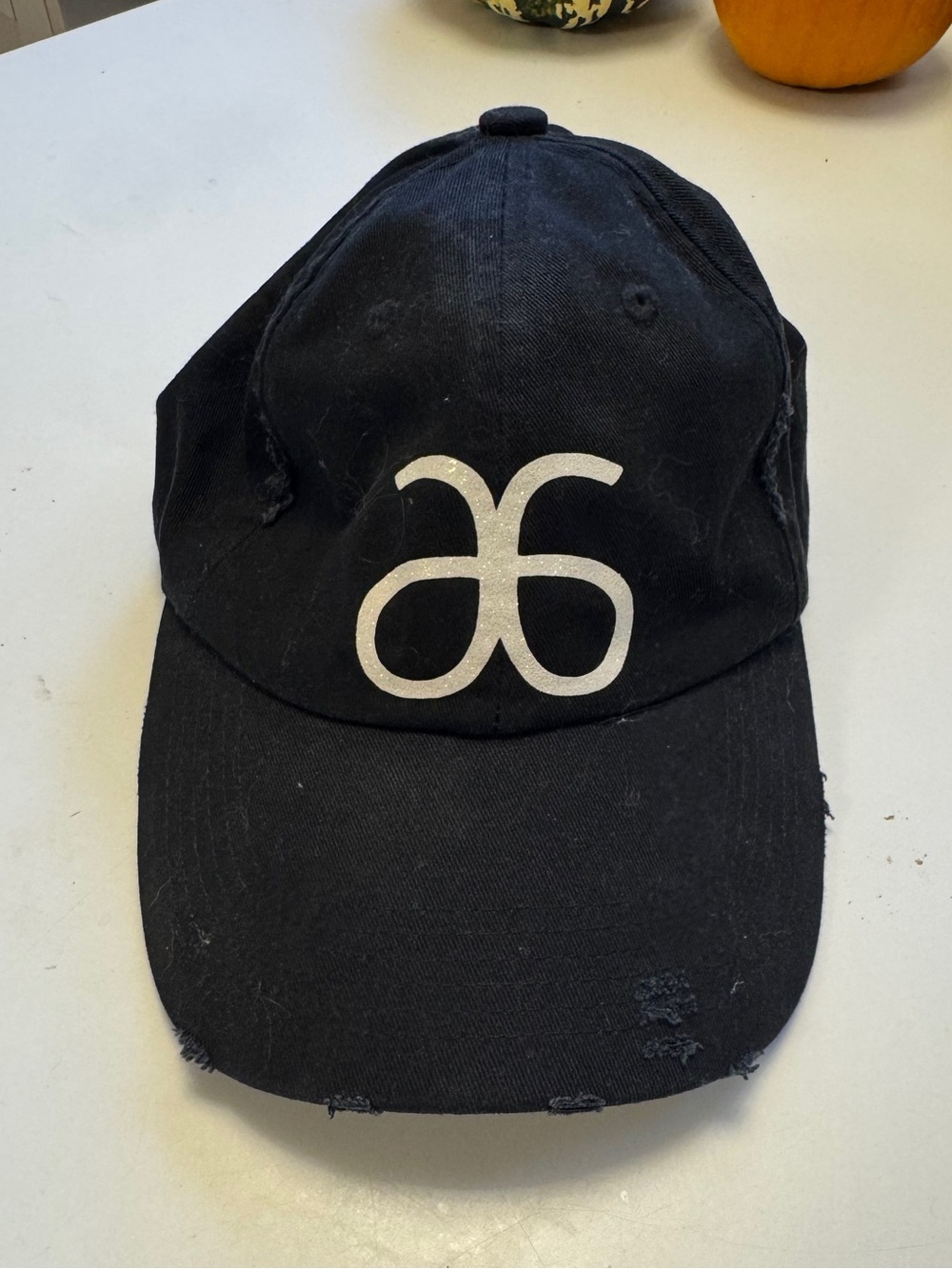 Arbonne Black Baseball Cap with White Logo